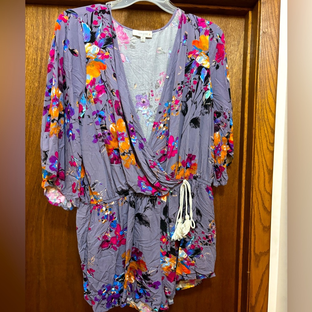 2XL gray romper adorned with a stunningly vibrant floral design